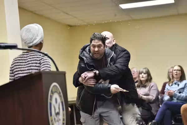 Questions linger after man sprays liquid onto Rep. Ilhan Omar during speech on impeachment — hazmat identifies liquid