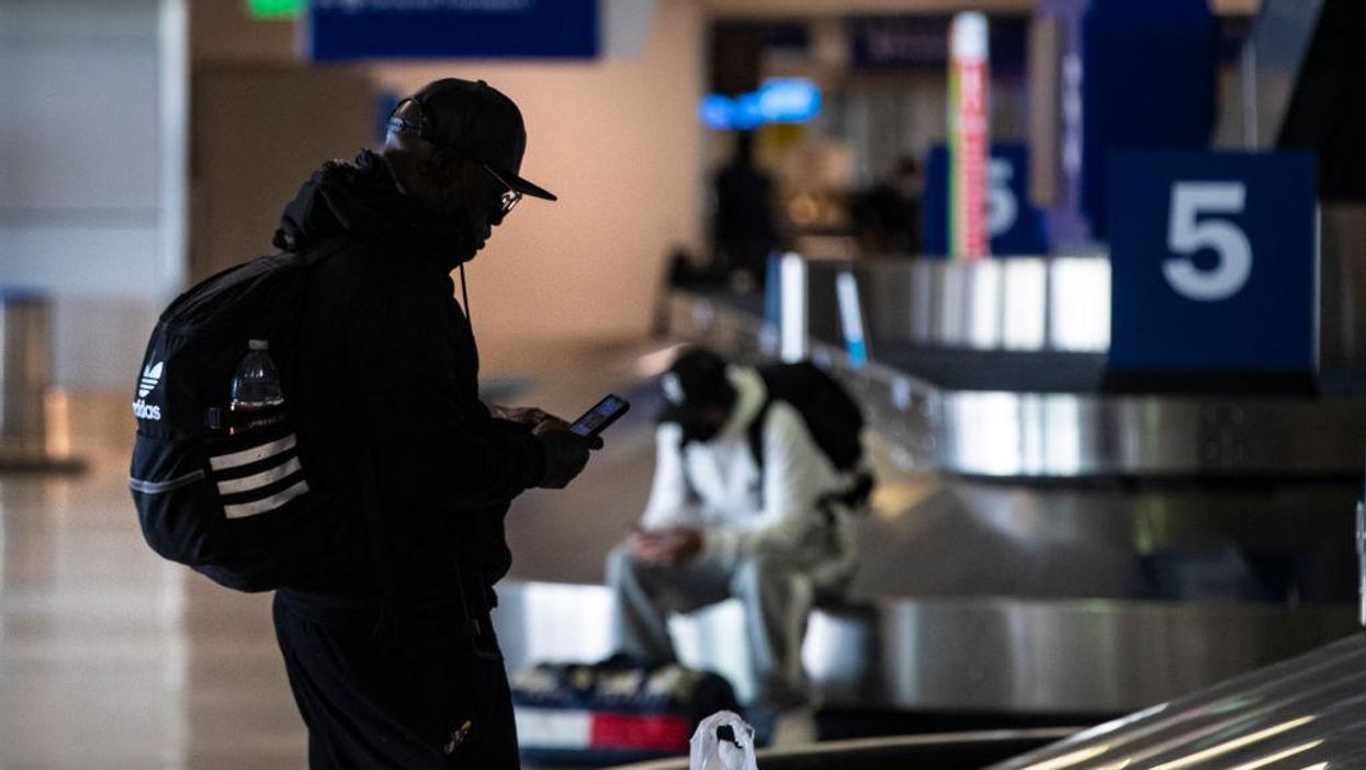 Quick-thinking cop saves the life of knife-wielding suicidal man by turning up the heat at the airport