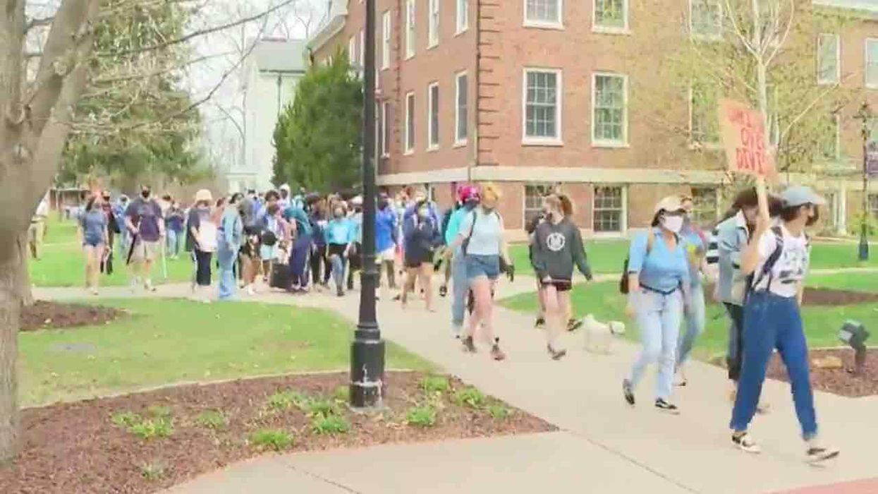 Racist graffiti appears in college dorm. NAACP condemns the act; students march and boycott — then a black student admits he did it.