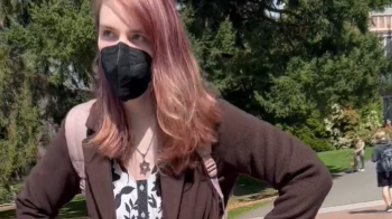 Raging transgender activist caught on video flipping Turning Point USA table at University of Washington: 'Get the f*** off my campus, you Nazi!'