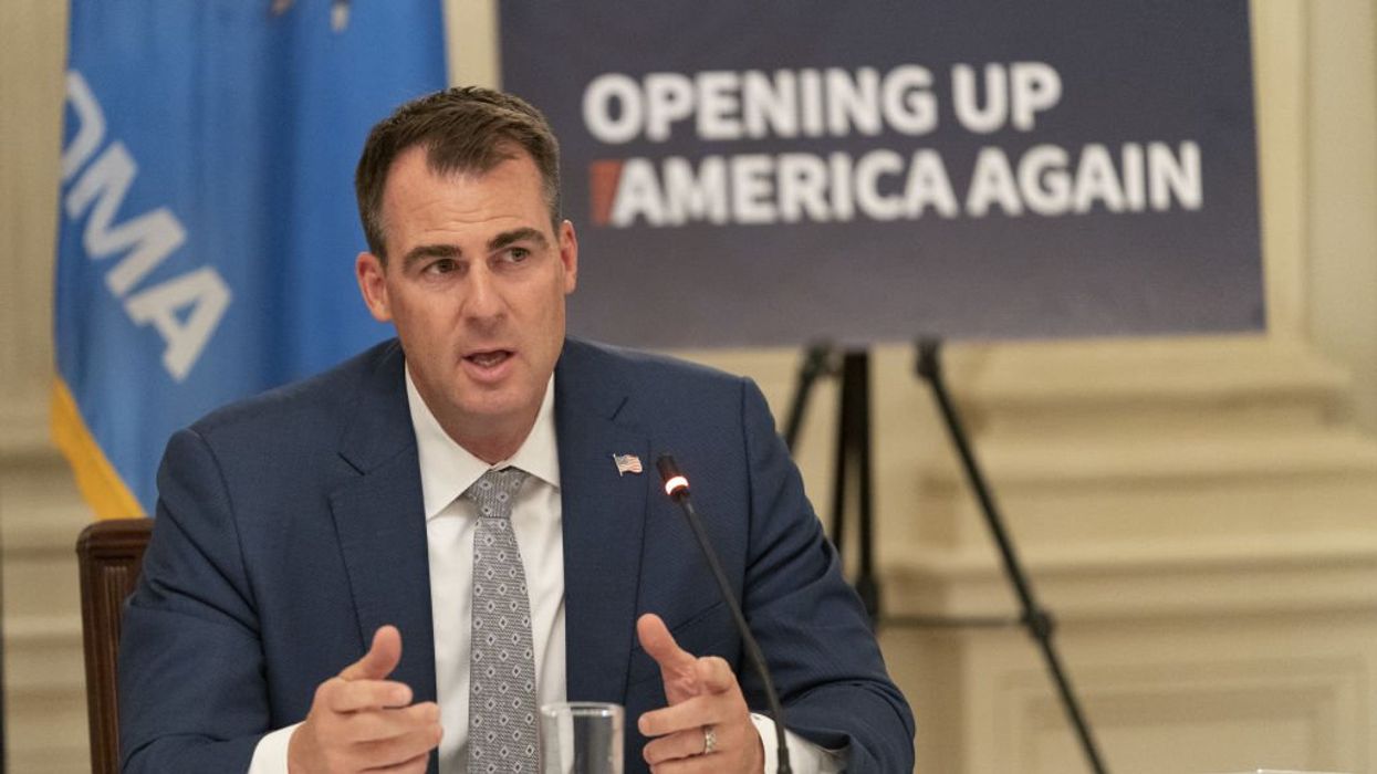 Red-state governor talks tough on immigration, saves cheap labor