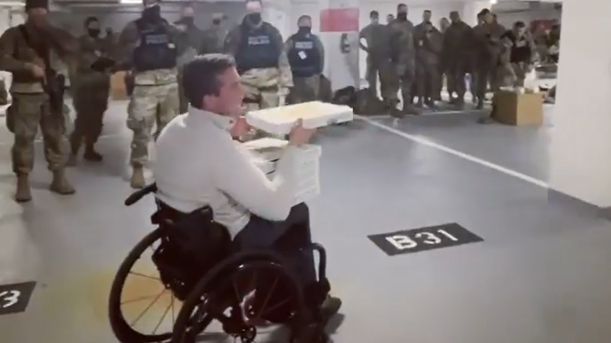 Rep. Madison Cawthorn delivers pizza to National Guard in parking garage, declares 'our troops deserve better'