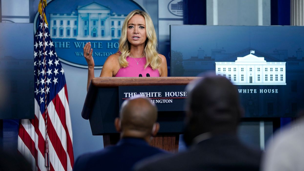 Reporter asks press secretary why it's OK for the president to have thousands of people at his outdoor rallies. She explains: These are 'peaceful protests.'