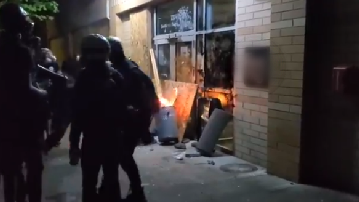 Riot declared in residential Portland after insurgents attempt to burn down police station, try to run over cops