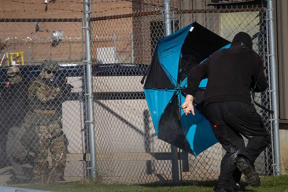 'Rioter' allegedly carrying firearm arrested outside Illinois ICE facility