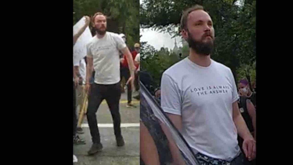 Rioter wearing 'Love Is Always the Answer' T-shirt accused of bashing cop in head with baseball bat