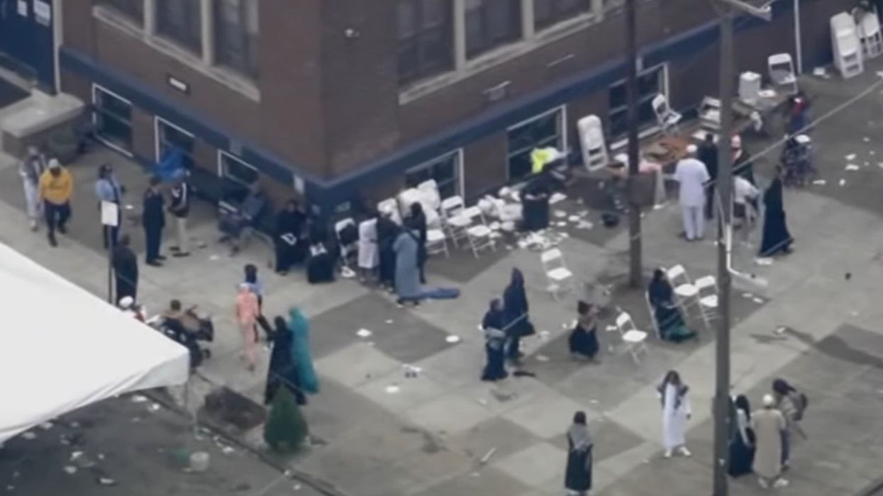 Rival 'factions' of 'young people' exchange gunfire in crowd of 1,000 gathered for Muslim celebration in Philadelphia: Police