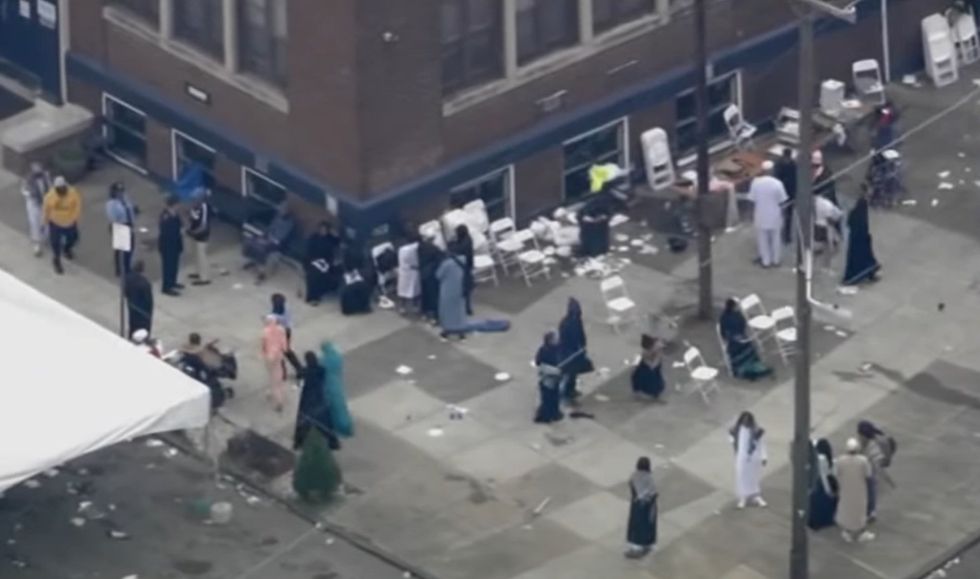 Rival ';factions'; of ';young people'; exchange gunfire in crowd of 1‚000 gathered for Muslim celebration in Philadelphia: Police