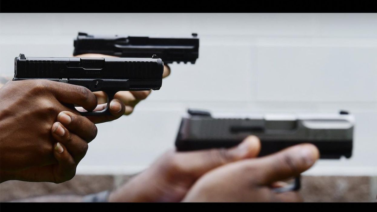 Robber pointing .45 at store clerk's head runs into big problems when 3 gun-toting customers come to the rescue