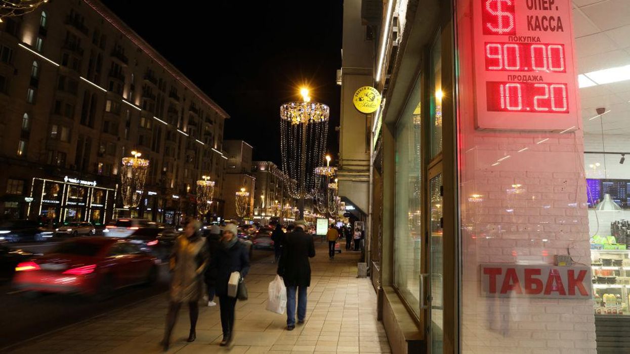 Russian ruble craters to less than 1 US cent, stock market freezes after Russia's removal from global banking system