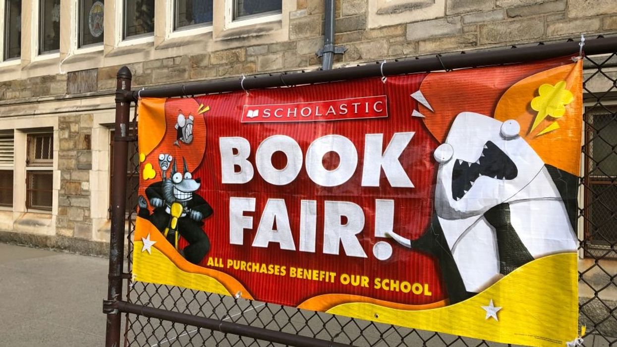 Scholastic backtracks on giving elementary schools the option of not displaying race- and gender-focused collection at book fairs