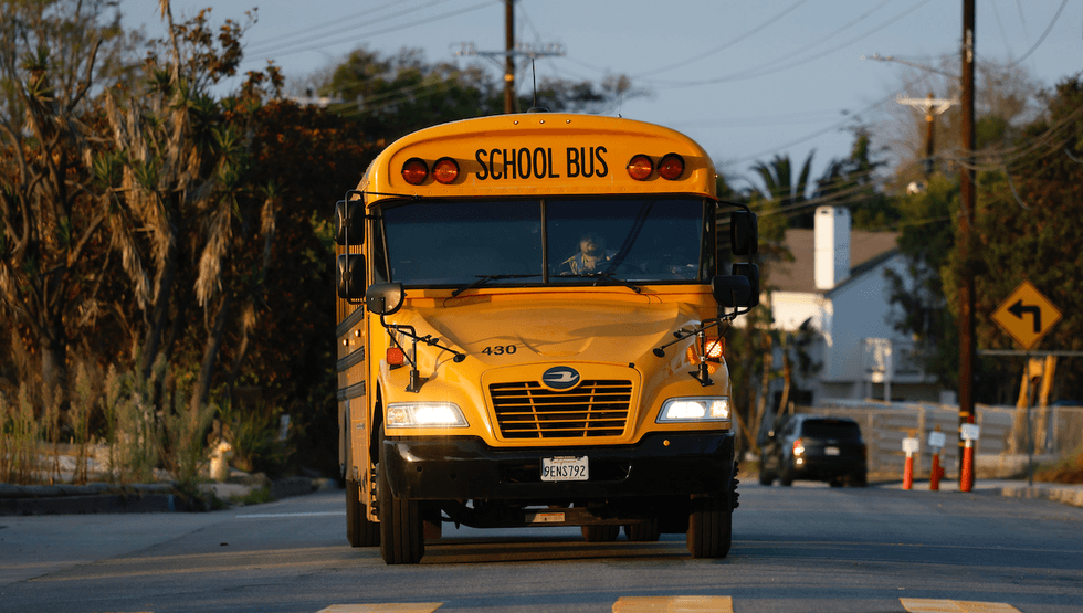 School bus ride from hell: Students, parent climb through bus windows; parent breaks glass on door,
