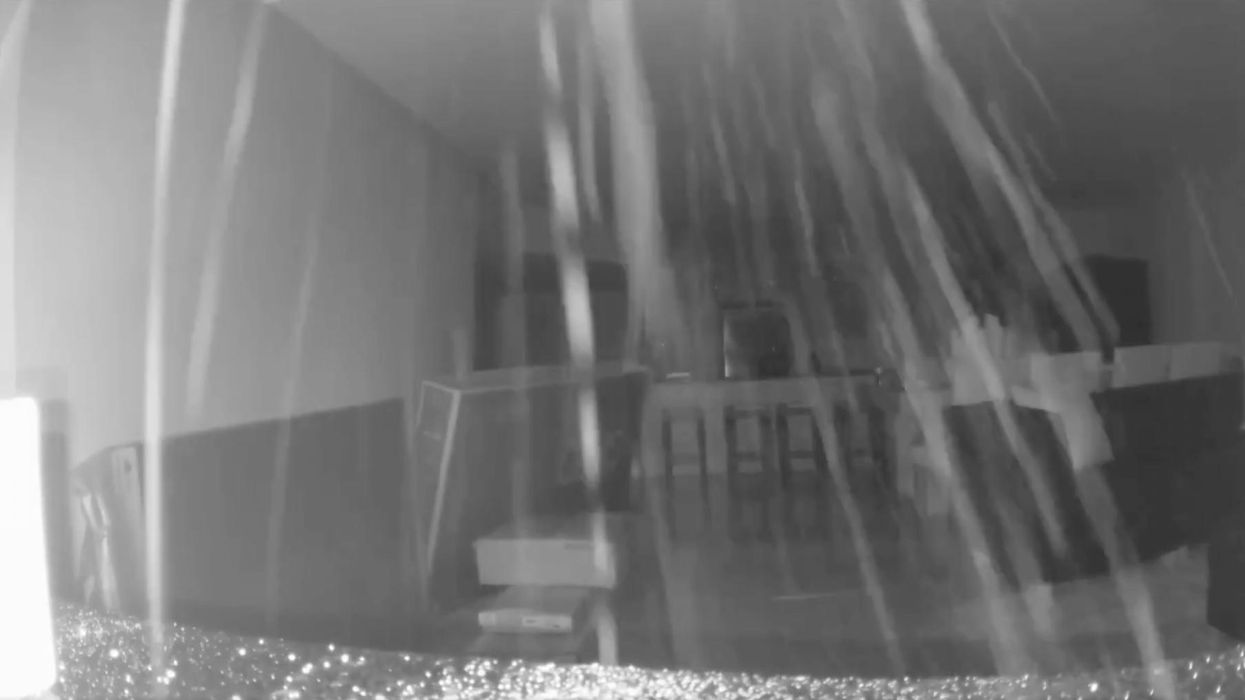 Security footage from inside Florida condo captures moments just before collapse as debris rains and building groans