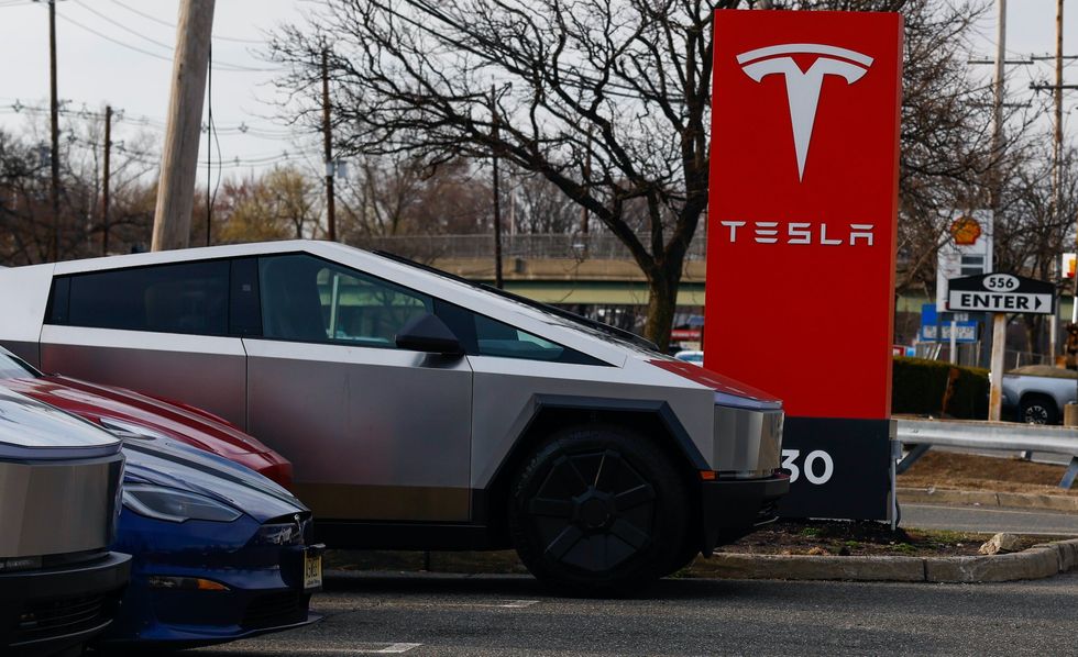 Security video shows man ramming ATV into Tesla vehicle; police say he damaged two others and scratched 'Elon' into them