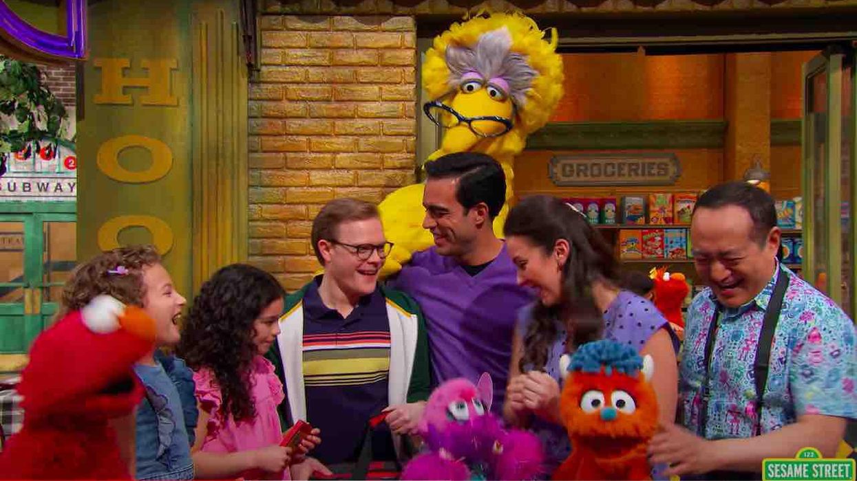 'Sesame Street' introduces two gay dads and their daughter for 'Family Day' episode — the first married gay couple to appear on iconic children's show