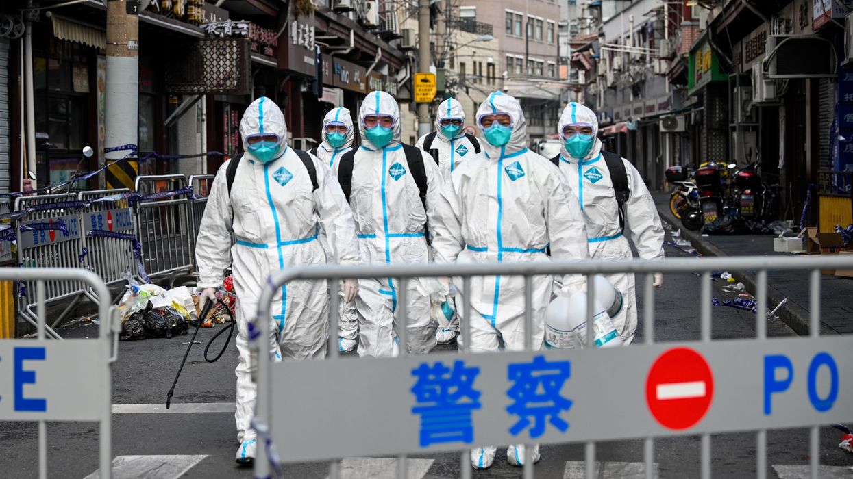 Shanghai begins phased lockdown as COVID surges in China's largest city