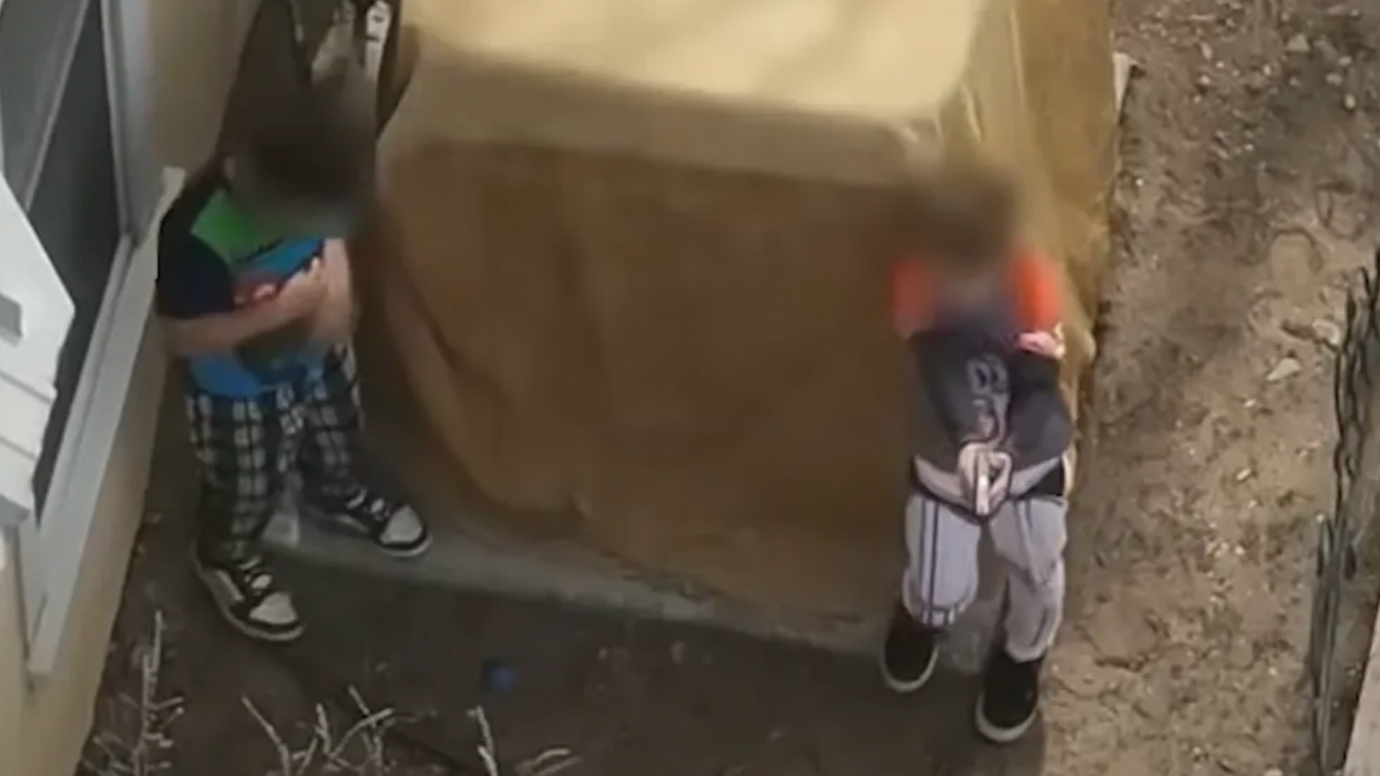 Shocking video: Boys, just 7 and 9 years old, wrestle for loaded gun — and 1 points it at deputies during tense standoff