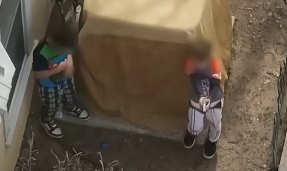 Shocking video: Boys, just 7 and 9 years old, wrestle for loaded gun — and 1 points it at deputies during tense standoff
