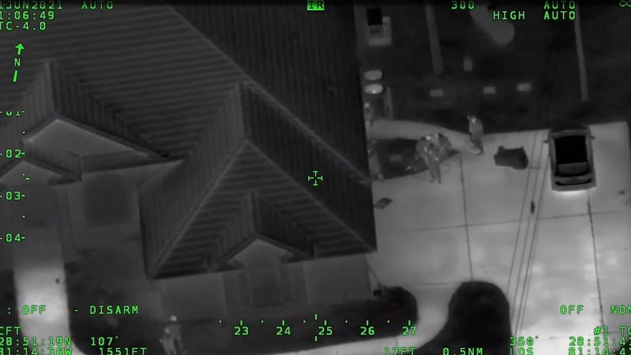 Shocking video shows the moment 14-year-old, 12-year-old open fire on police with an AK-47 and other weapons