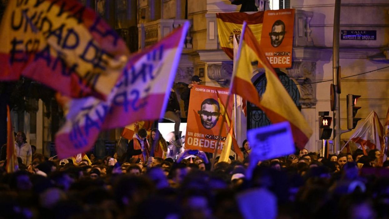 Spain's socialist regime strikes deal with secessionists to stay in power, sparking unrest