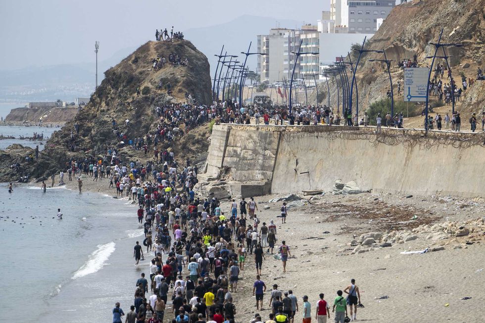 Spain says 25,000 migrants have been expelled from tiny Ceuta territory — with at least 34 DEATHS