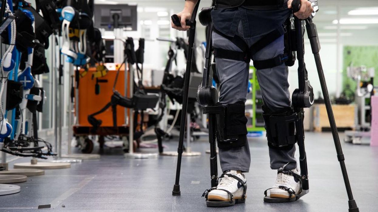'Stand-up guy again, not just a role model': Exoskeleton enables U.S. Army veteran to walk away from his wheelchair