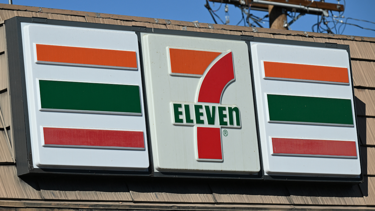 Street takeover thugs beat up 7-Eleven worker who tries to keep them from looting store. But he's no match for mob of 50.