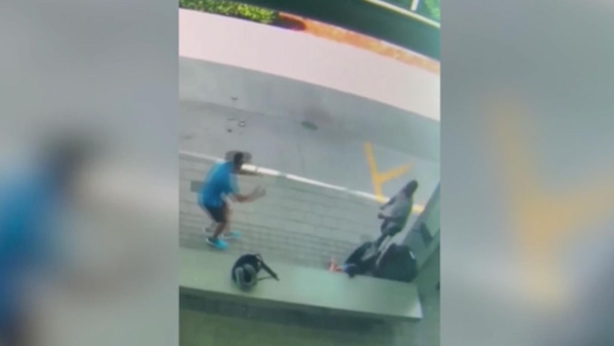 Surveillance video captures the moment a Good Samaritan intervenes during a vicious strangling attack
