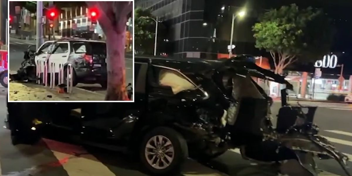 Suspect steals LAPD cruiser, drags cop alongside until he crashes into ...
