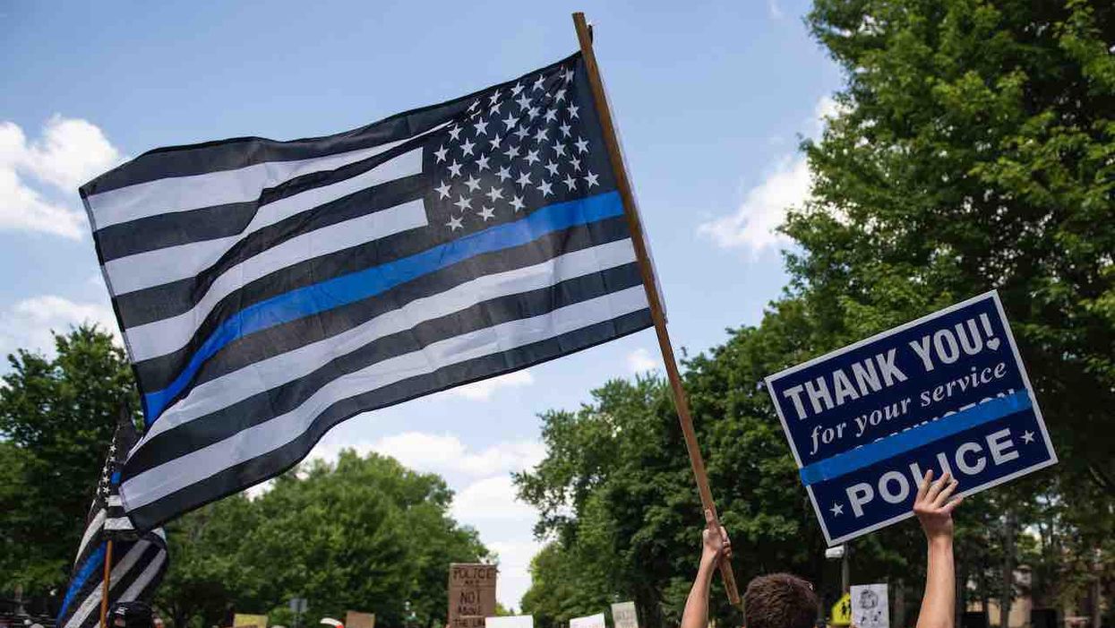 Teacher ordered to take down 'political' Thin Blue Line flag honoring her brother, a former cop — but Black Lives Matter, LGBTQ symbols are just fine