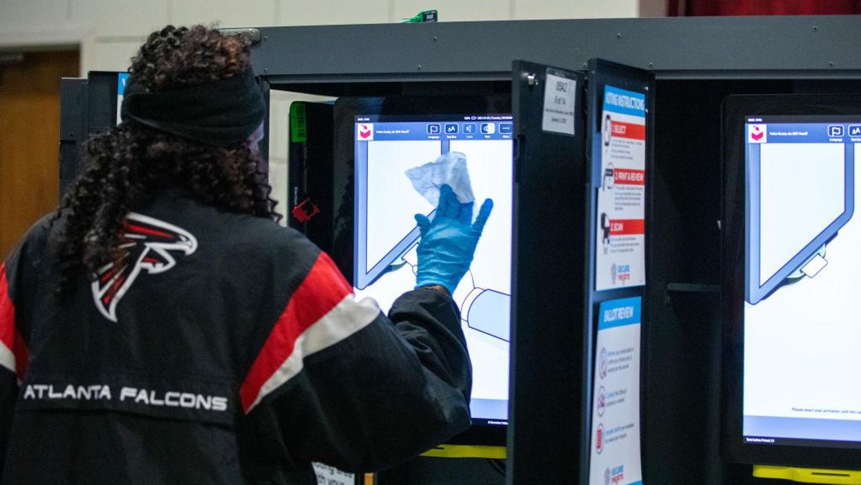 Technical issues with voting machines force voters to temporarily use paper ballots in Columbia County, Georgia