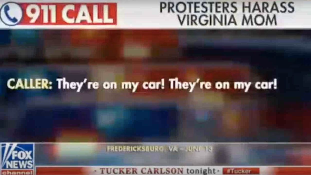 Terrified mother to 911 about protesters: 'They're on my car right now'