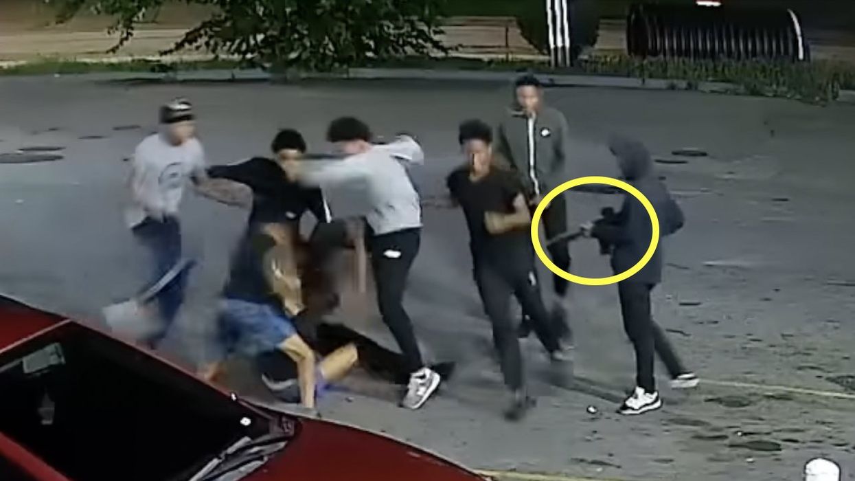 Terrifying video: 'Animalistic' teen thugs, some with guns, randomly ​beat up man minding his own business outside store