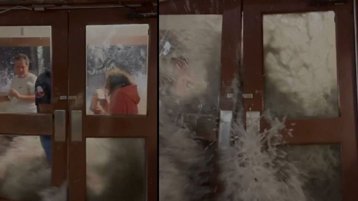 Terrifying video captures moment monster wave blasts Army garrison door to smithereens