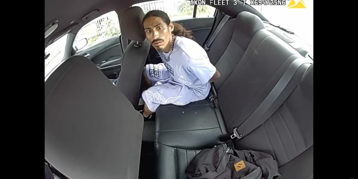 Terrifying video: Suspect in police car removes handcuffs, hops behind wheel, and drives away — as cop tries to stop him
