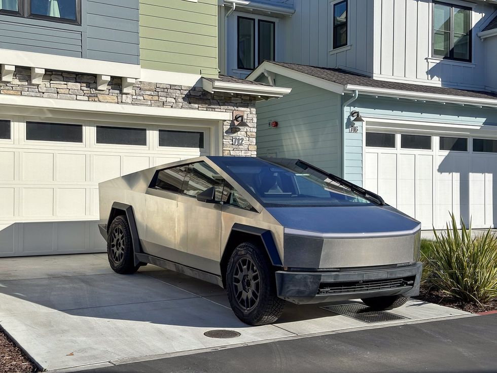 Tesla owner vows to 'make an example' of masked intruder who wrecked his Cybertruck: 'That's basically declaring war on me'