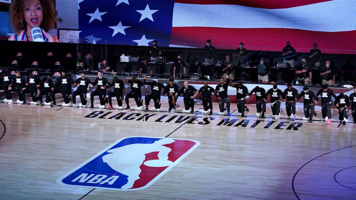 The NBA won't enforce rule requiring players to stand for the national anthem