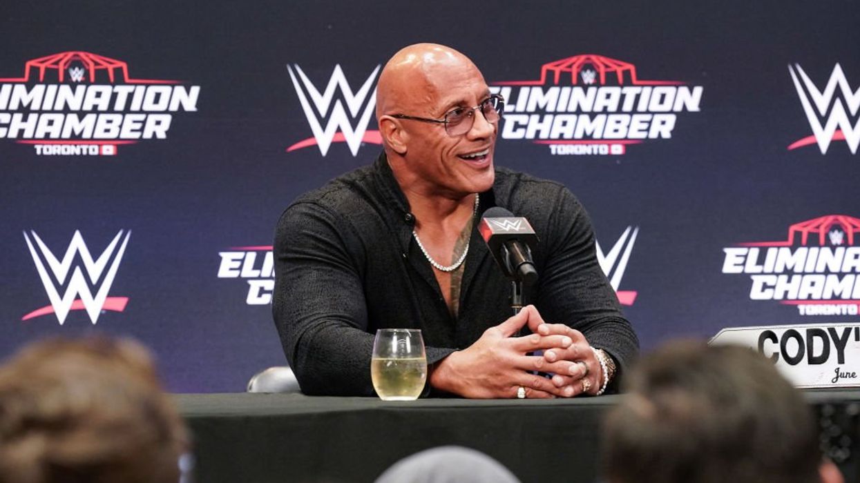 The Rock responds to WrestleMania criticism by telling media the whole business is fake: 'Enjoy the show'