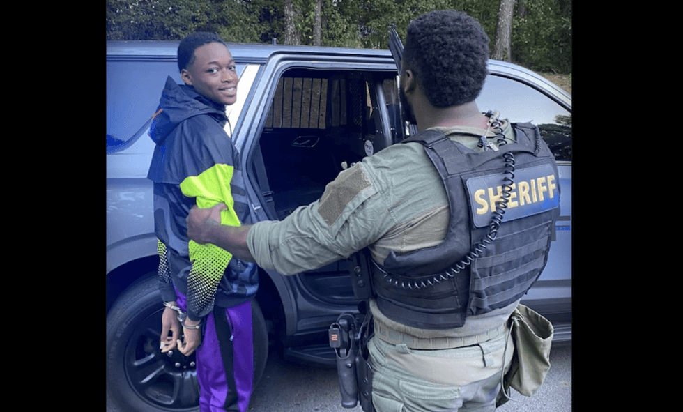 Thug who grinned in arrest photo after boy was murdered just got his sentence — and it should wipe smile right off his face