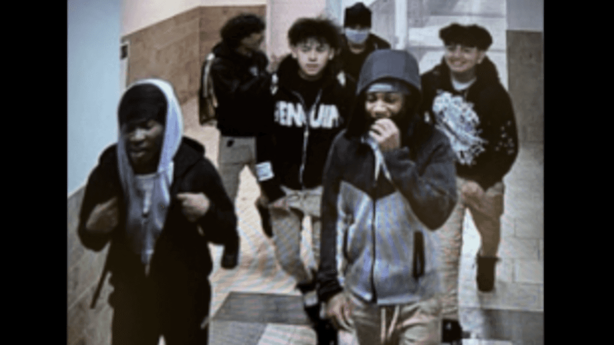 Thugs seen laughing, smiling on video apparently after they ganged up on, assaulted, stabbed lone victim in mall restroom
