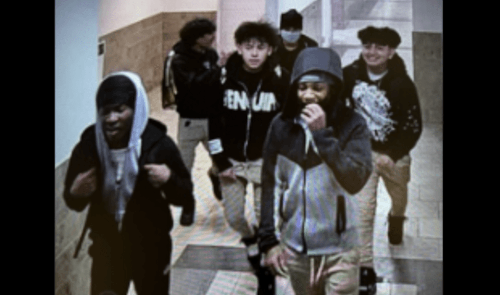 Thugs seen laughing, smiling on video apparently after they ganged up on, assaulted, stabbed lone victim in mall restroom