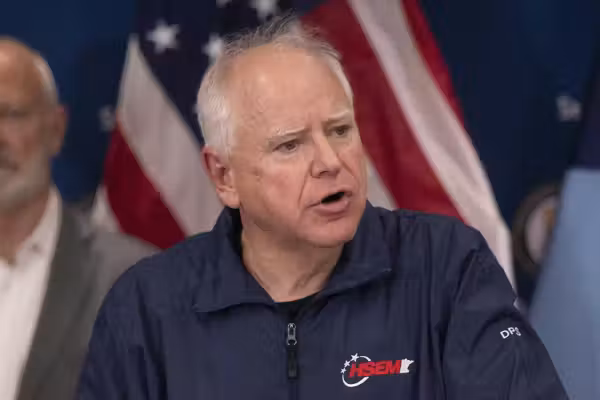 Tim Walz says Minnesota is 'at war' with the federal government after fatal ICE shooting