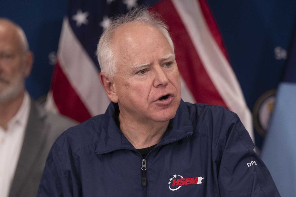 Tim Walz says Minnesota is 'at war' with the federal government after fatal ICE shooting