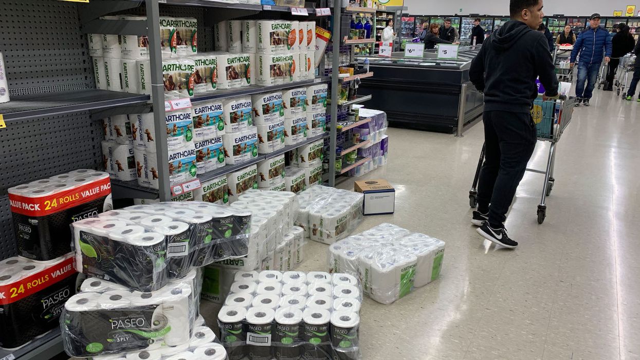 Toilet paper in a grocery store floor