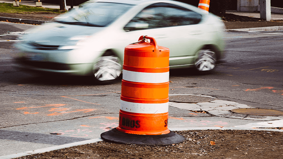Traffic cones and barrels are spying on you — what are they hiding?