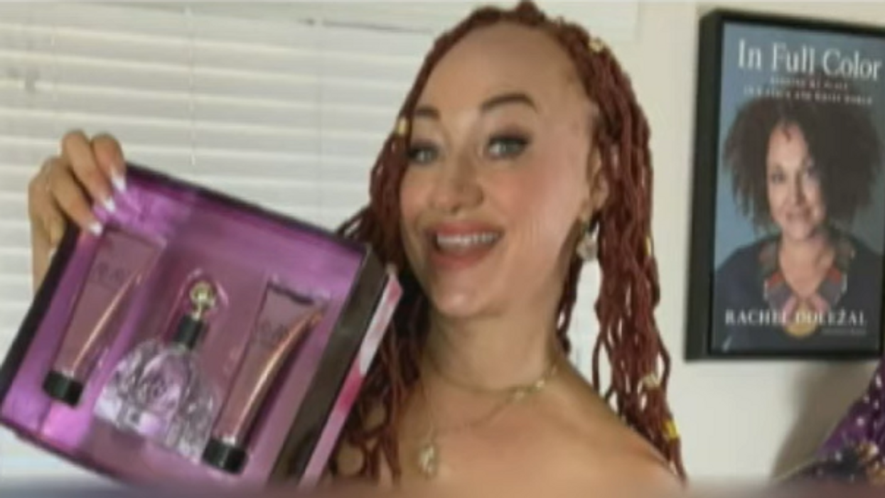 Transracial hustler Rachel Dolezal fired from teaching job after reportedly posting explicit content to her risqué OnlyFans page
