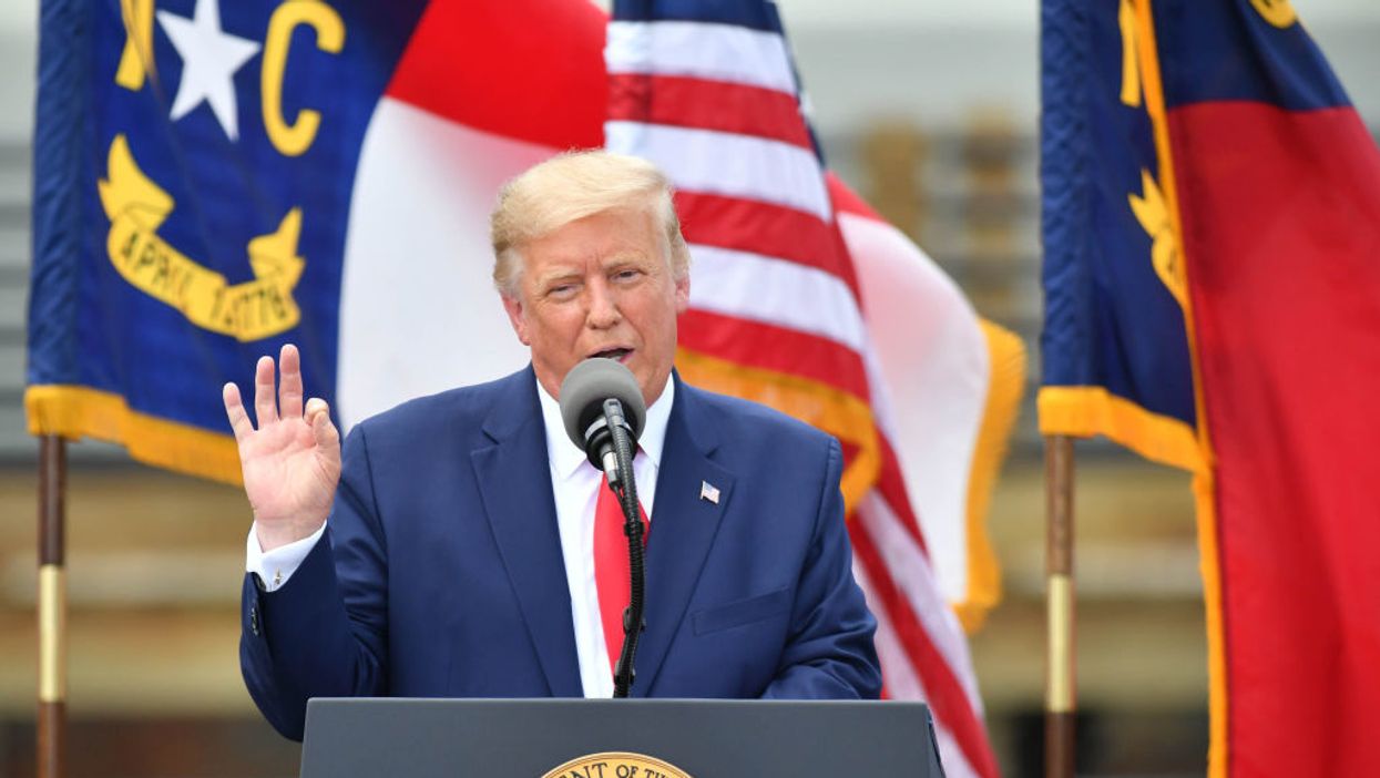 Trump encourages NC voters to test voting system by mailing in votes and trying to vote in person. White House says he is not advocating doing 'anything unlawful.'