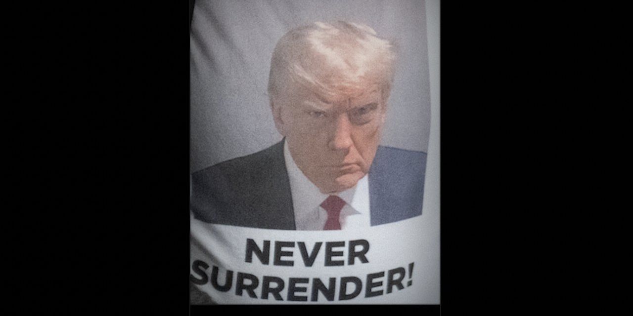 Trump fans unfurl 'Never Surrender' banner with his mug shot during national anthem at Yankee Stadium - Vimarsana News