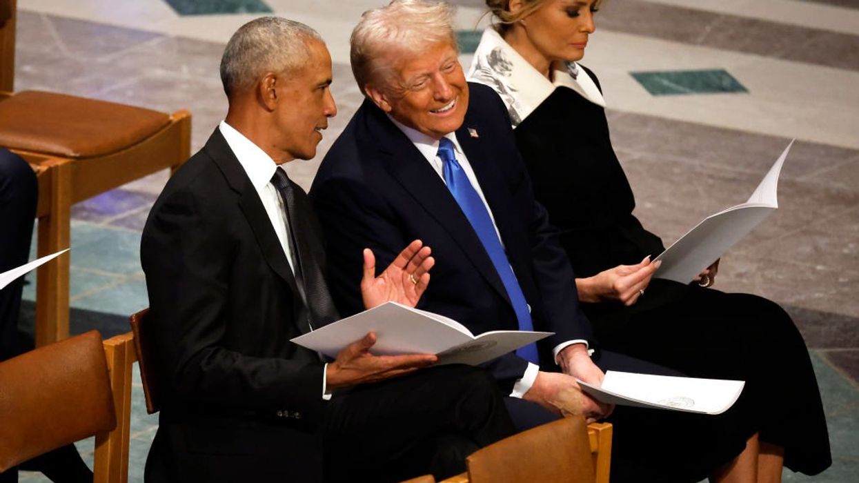 Trump gets chummy with Obama at Carter funeral, leaving Kamala Harris scowling