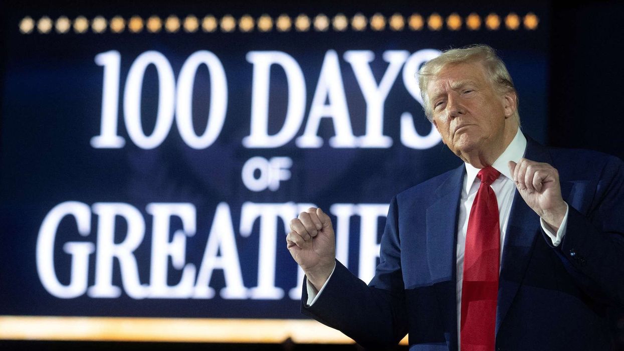 Trump laughs off 'radical left lunatic' protester at Michigan rally: 'Sorry ma'am — I thought it was a guy!'